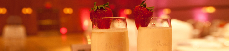 Champagne glasses, strawberry garnish